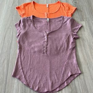 (2) Free People “One Of The Girls” Waffle Knit baby doll T-shirts.